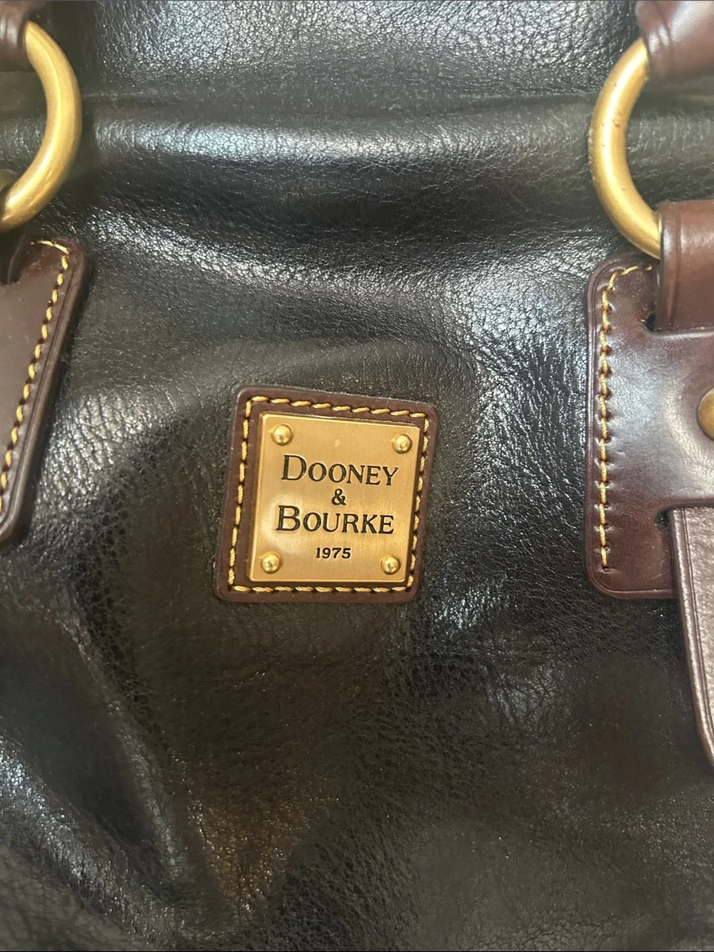 Dooney & Bourke Black Leather Satchel with Brown Trim and Gold Hardware